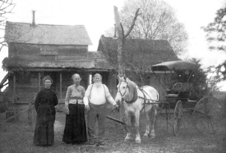 Cornelia Lassiter, Lavina Jane and John Anderson Roberts in front of their Lamar County Home in the Maxey Community ca 1890 - 1895