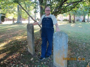 Gary between the headstones of Thomas and Elizabeth Gibson Blackwell in Franklin, TN